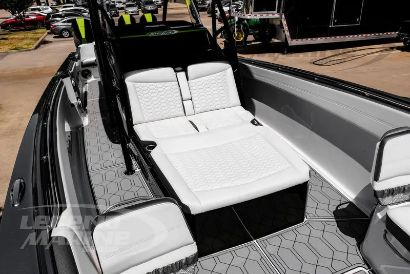 Slide: The Image of 2024 Nor-Tech 390 Sport Center Console with luxurious white seating and sleek design. - 33