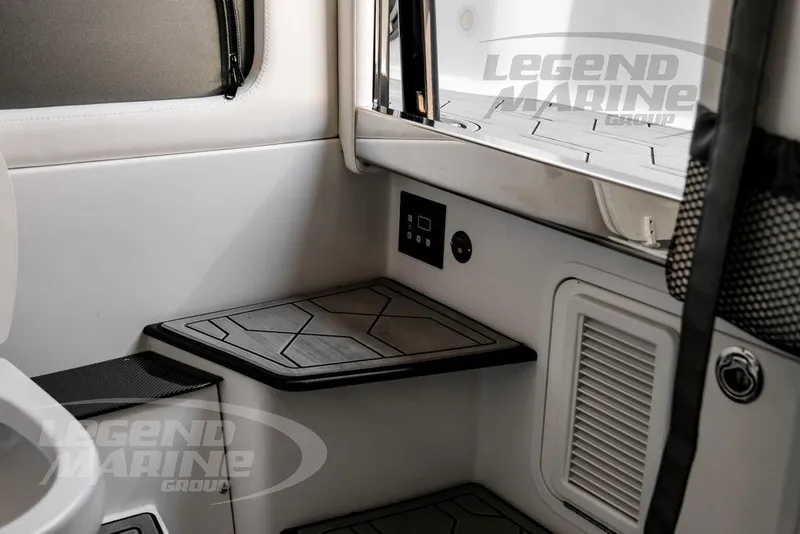 Slide: The Image of Interior of 2024 Nor-Tech 390 Sport Center Console, featuring sleek design and modern controls. - 51