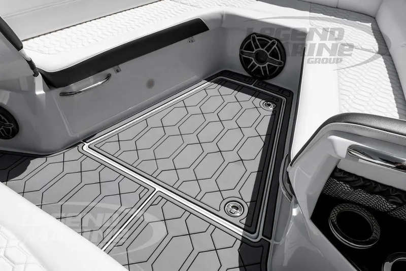 Slide: The Image of 2024 Nor-Tech 390 Sport Center Console interior with stylish seating and modern speaker system. - 46