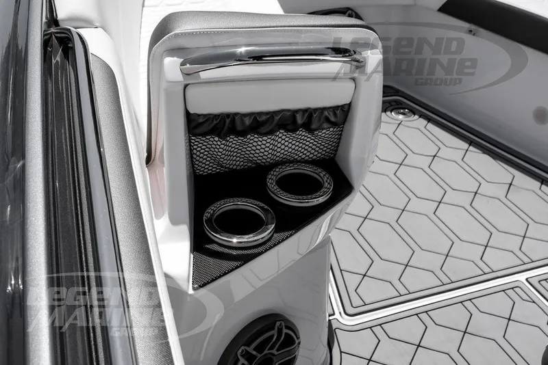 Slide: The Image of 2024 Nor-Tech 390 Sport Center Console interior with cup holders and stylish flooring. - 43