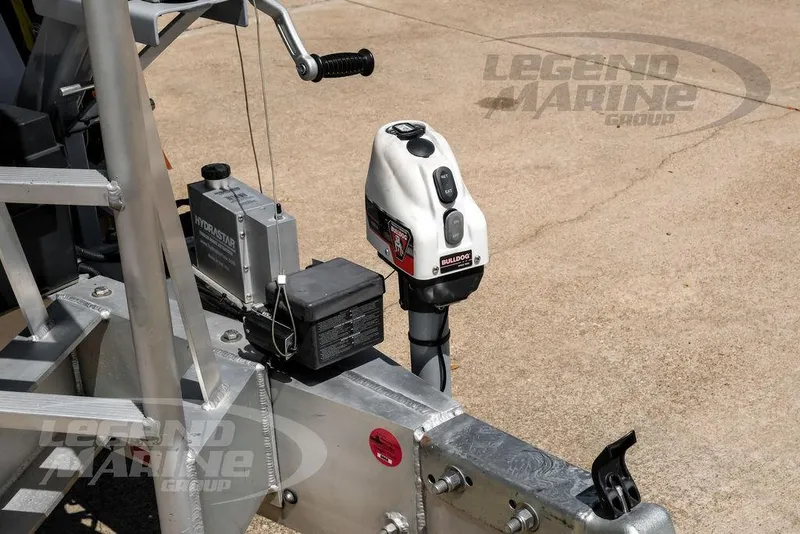 Slide: The Image of Trailer hitch with Bulldog jack and Hydrastar brake actuator, Nor-Tech 390 Sport Center Console, 2024. - 68