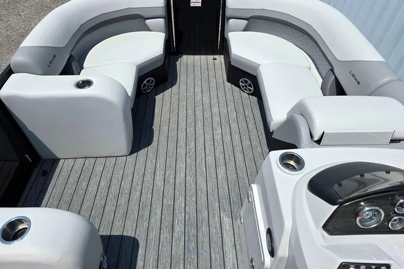 Slide: The Image of 2023 Lowe SS 210 boat interior with sleek seating and modern design. - 4