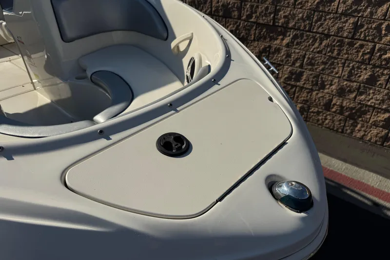 Slide: The Image of 2008 Sea Ray 205 Sport boat bow with seating and storage compartment. - 9