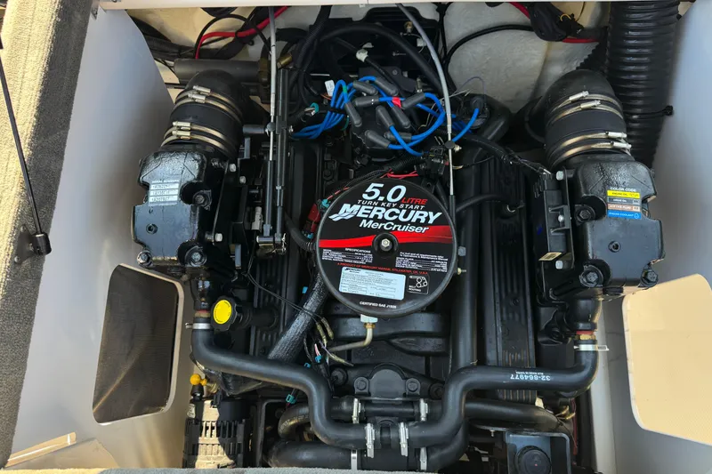 Slide: The Image of Engine compartment of a 2008 Sea Ray 205 Sport with Mercury MerCruiser 5.0L engine. - 21