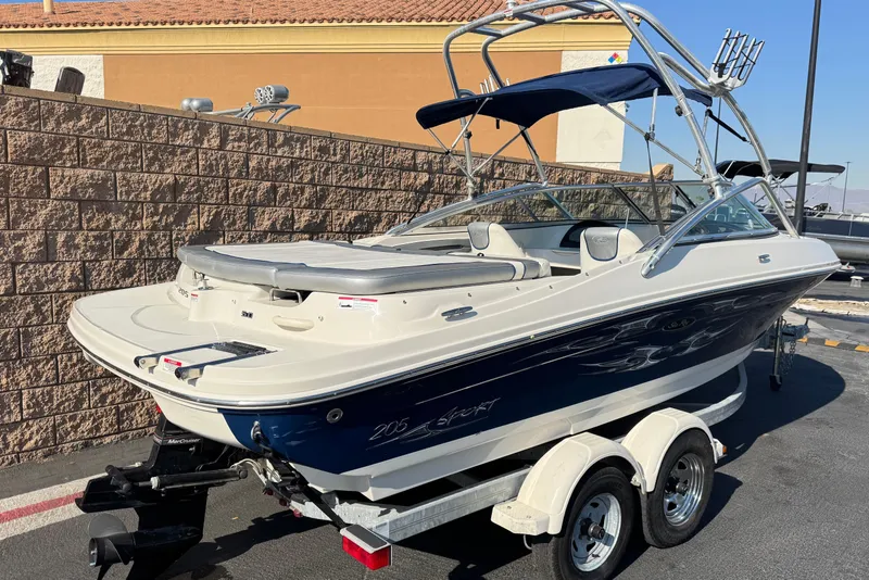 Slide: The Image of 2008 Sea Ray 205 Sport boat on trailer, parked outdoors. - 5