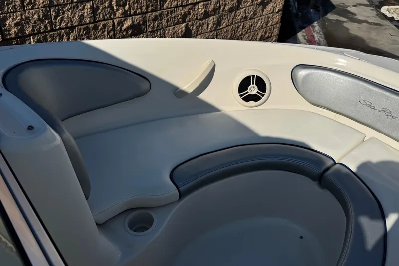 Slide: The Image of Interior seating of a 2008 Sea Ray 205 Sport boat with speaker detail. - 13