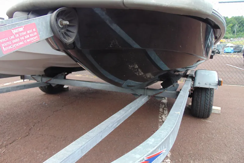 Slide: The Image of 2006 Yamaha WaveRunner FX on trailer, close-up view of hull and trailer details. - 9