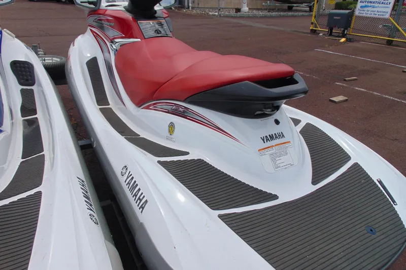 Slide: The Image of 2006 Yamaha WaveRunner FX with red seat, parked on a trailer. - 3