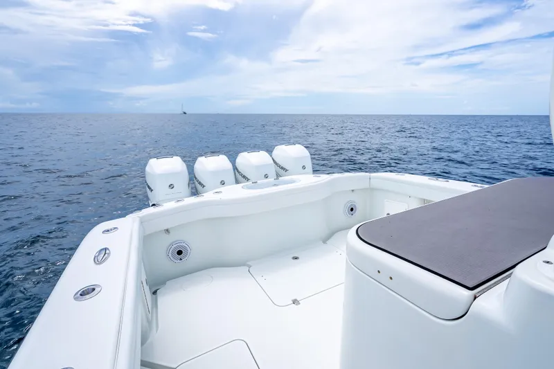 Slide: The Image of 2016 Yellowfin 39 Offshore boat with quad engines on open sea. - 35