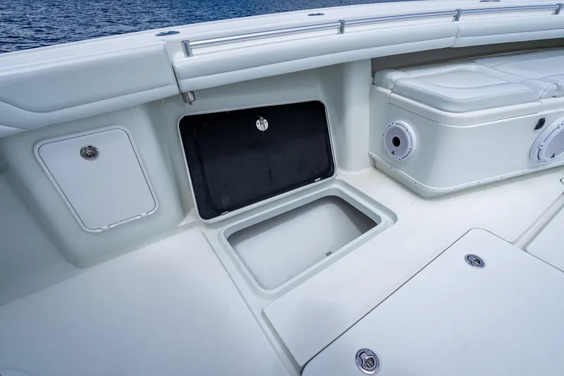 Slide: The Image of 2016 Yellowfin 39 Offshore boat deck with storage compartments and speakers. - 53