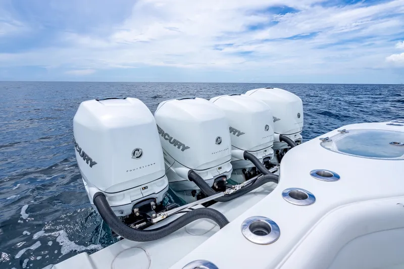 Slide: The Image of 2016 Yellowfin 39 Offshore boat with four Mercury outboard engines on open sea. - 40