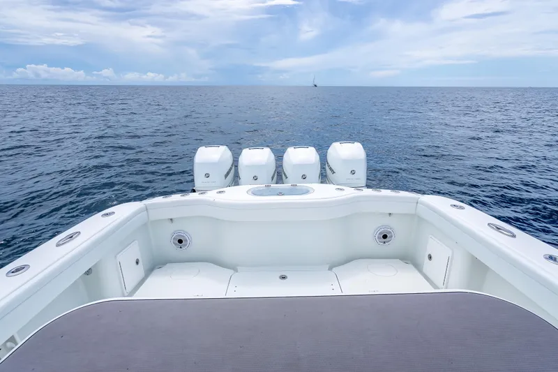 Slide: The Image of 2016 Yellowfin 39 Offshore boat with four engines on open sea. - 34