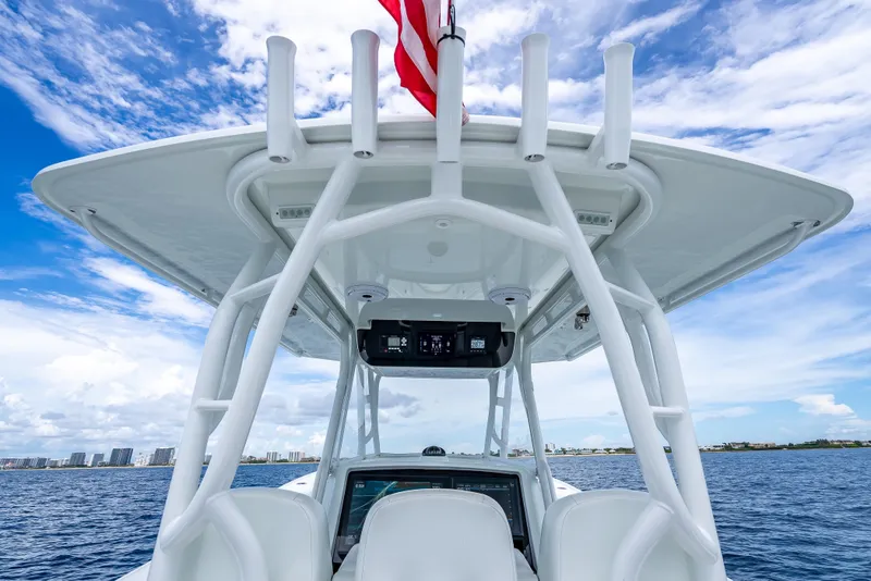 Slide: The Image of 2016 Yellowfin 39 Offshore boat with T-top and ocean view. - 25
