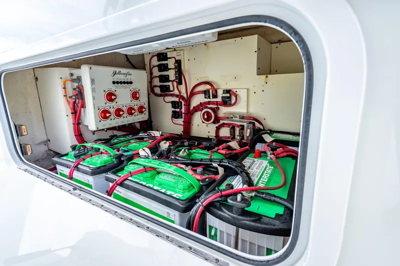 Slide: The Image of Electrical system of a 2016 Yellowfin 39 Offshore boat, featuring batteries and wiring. - 60