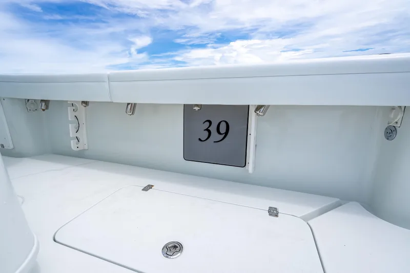 Slide: The Image of 2016 Yellowfin 39 Offshore boat interior with clear sky background. - 56