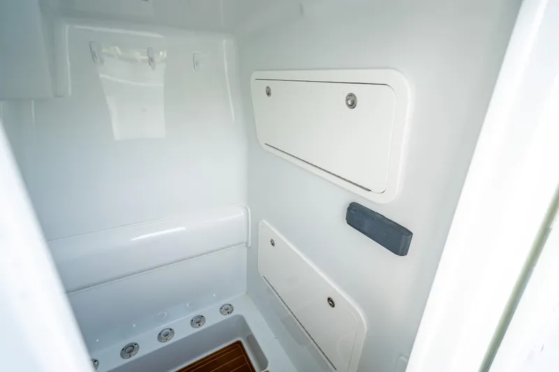 Slide: The Image of Interior view of 2016 Yellowfin 39 Offshore boat storage compartments. - 62