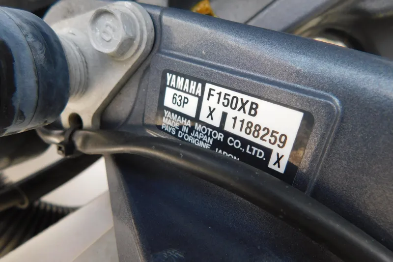 Slide: The Image of Close-up of Yamaha F150XB engine label on 2017 Tidewater 198 CC Adventure boat. - 32