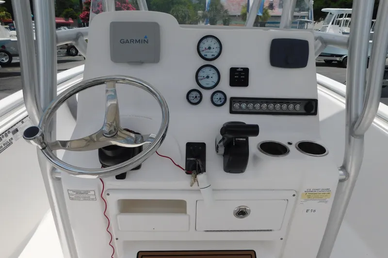 Slide: The Image of 2017 Tidewater 198 CC Adventure boat console with Garmin navigation and Yamaha controls. - 2