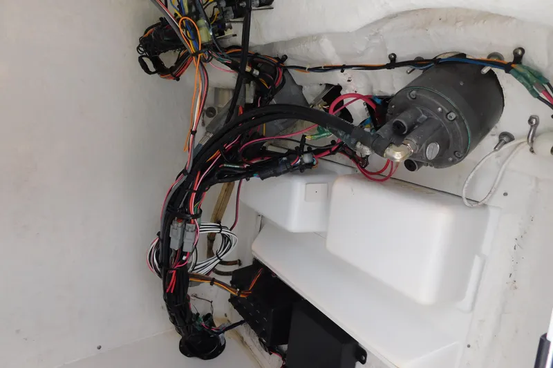 Slide: The Image of 2017 Tidewater 198 CC Adventure boat wiring and mechanical components. - 25
