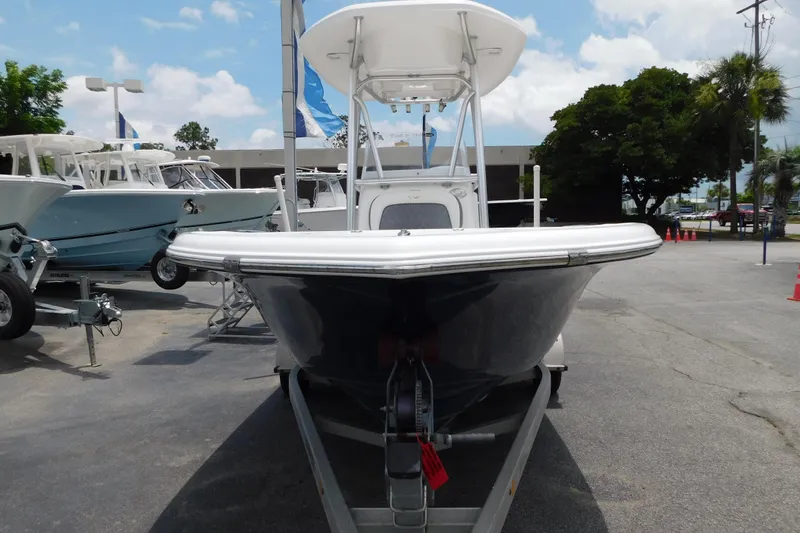 Slide: The Image of 2017 Tidewater 198 CC Adventure boat on trailer at dealership. - 12