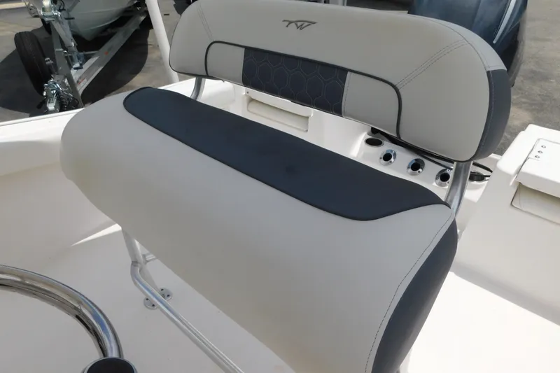 Slide: The Image of 2017 Tidewater 198 CC Adventure boat seat with sleek design and comfortable padding. - 28