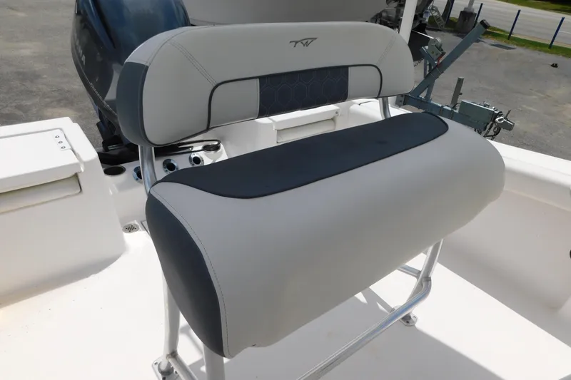 Slide: The Image of 2017 Tidewater 198 CC Adventure boat seat with sleek design and comfortable padding. - 4