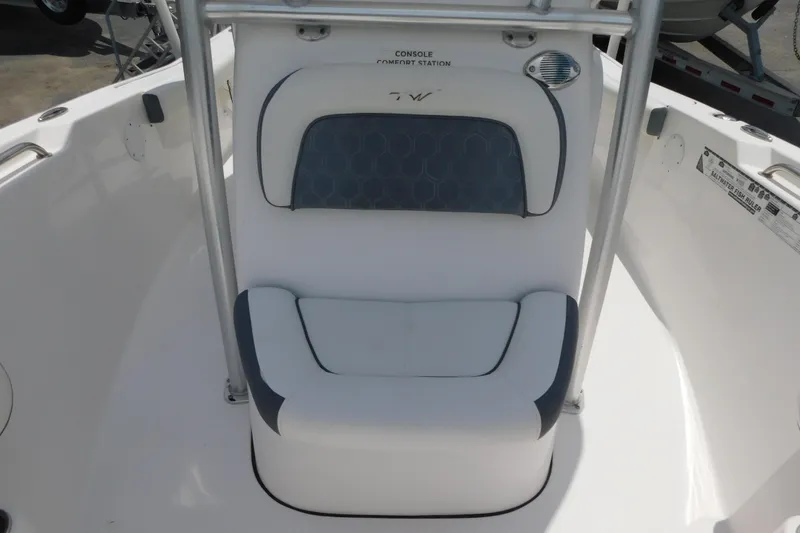 Slide: The Image of 2017 Tidewater 198 CC Adventure boat console seat with comfort station. - 9