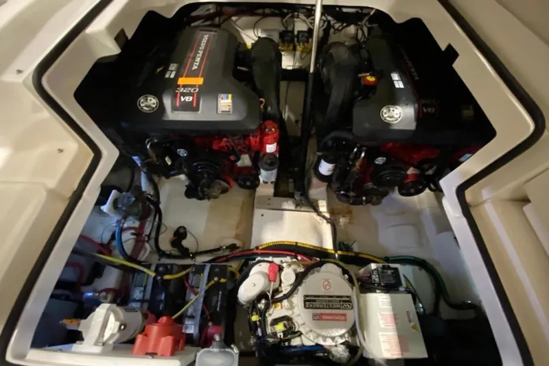 Slide: The Image of Engine compartment of a 2013 Chaparral 327 SSX boat, featuring dual Volvo Penta V8 engines. - 5