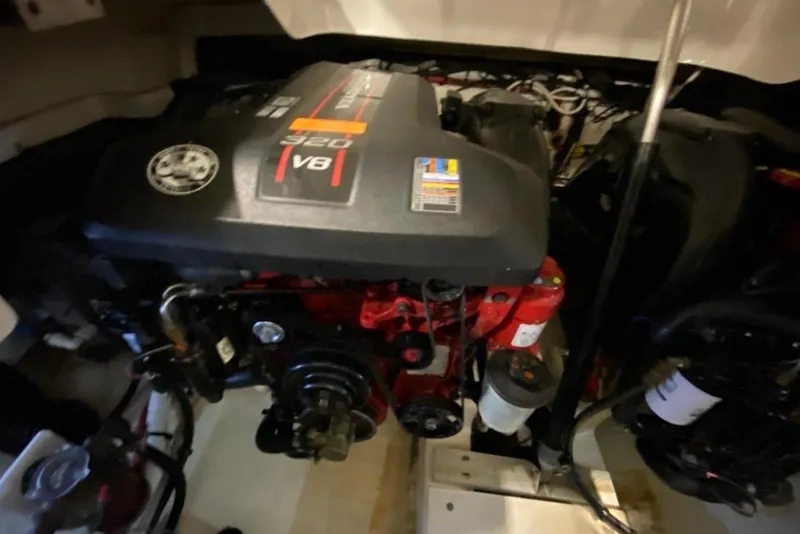 Slide: The Image of Engine compartment of a 2013 Chaparral 327 SSX with a 320 V8 engine. - 6
