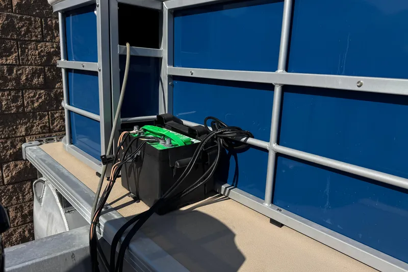 Slide: The Image of Battery setup on a 2014 Bentley Pontoons Encore 240 Cruise boat deck. - 9