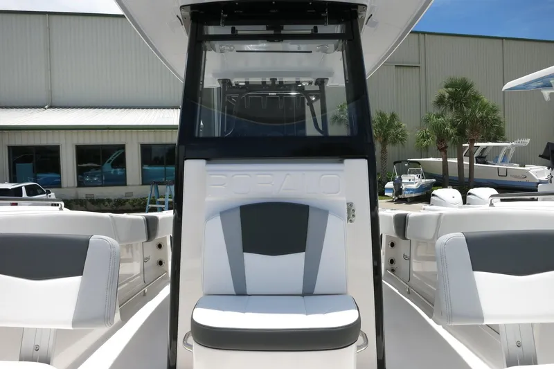 Slide: The Image of 2026 Robalo R270 Center Console boat interior with seating and console view. - 66