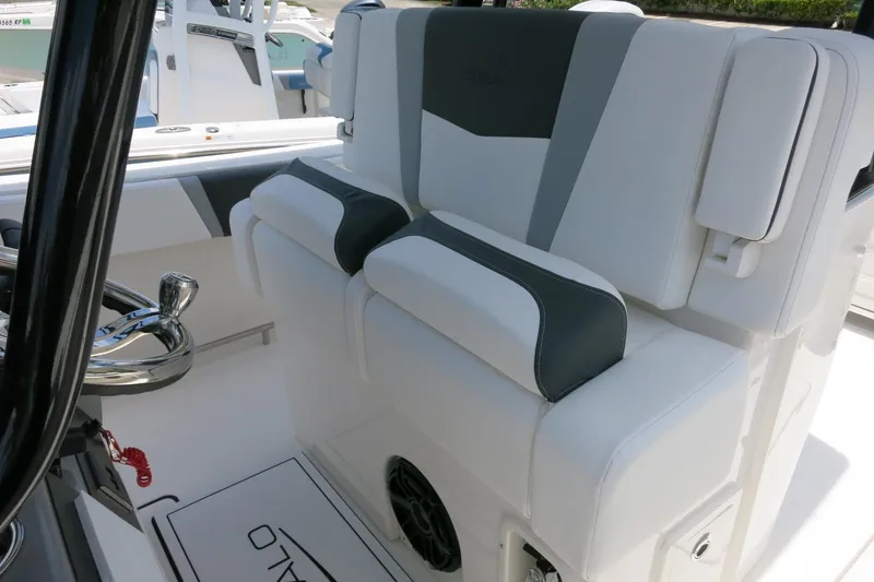 Slide: The Image of 2026 Robalo R270 Center Console boat seating with sleek, modern design and comfortable upholstery. - 30