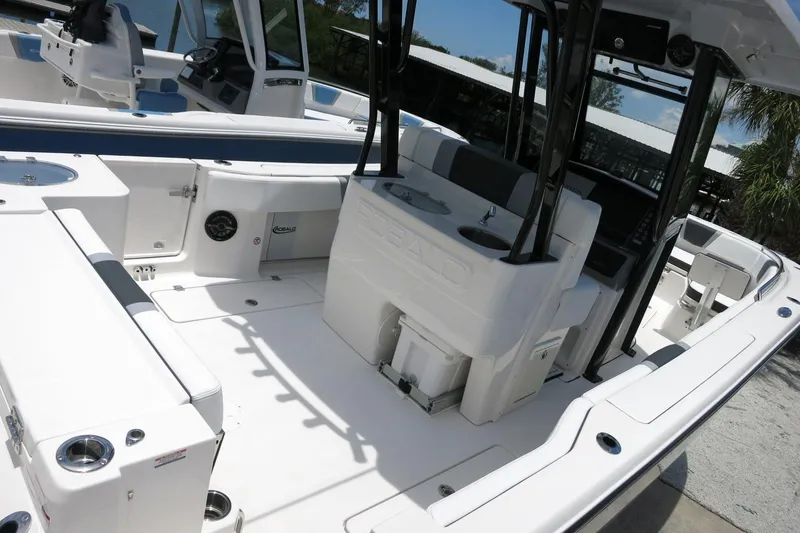 Slide: The Image of 2026 Robalo R270 Center Console boat interior with sleek design and modern amenities. - 44