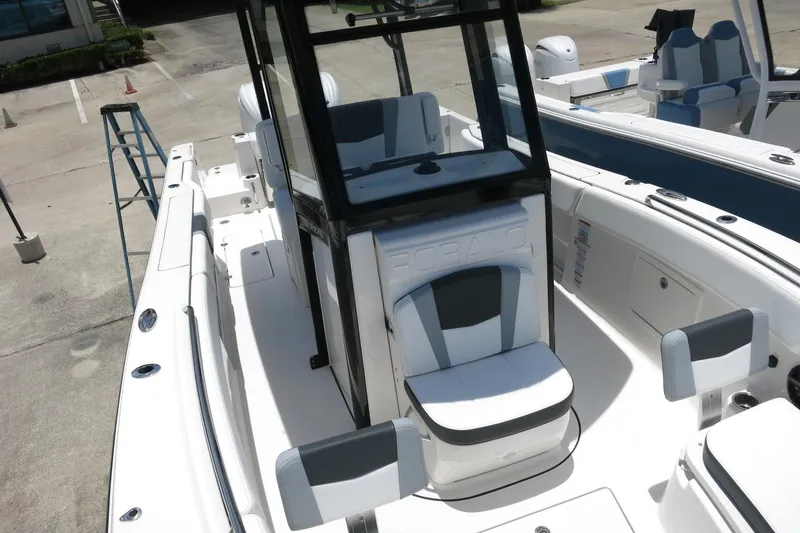 Slide: The Image of 2026 Robalo R270 Center Console boat with sleek seating and modern design. - 64