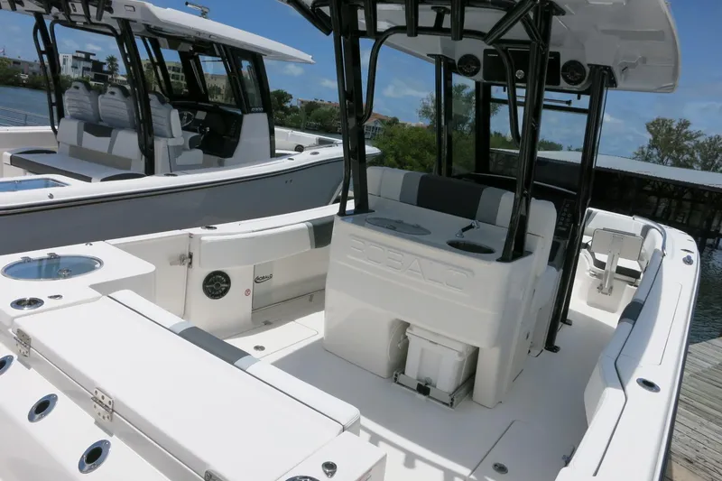 Slide: The Image of 2026 Robalo R270 Center Console boat with sleek design and spacious seating. - 8