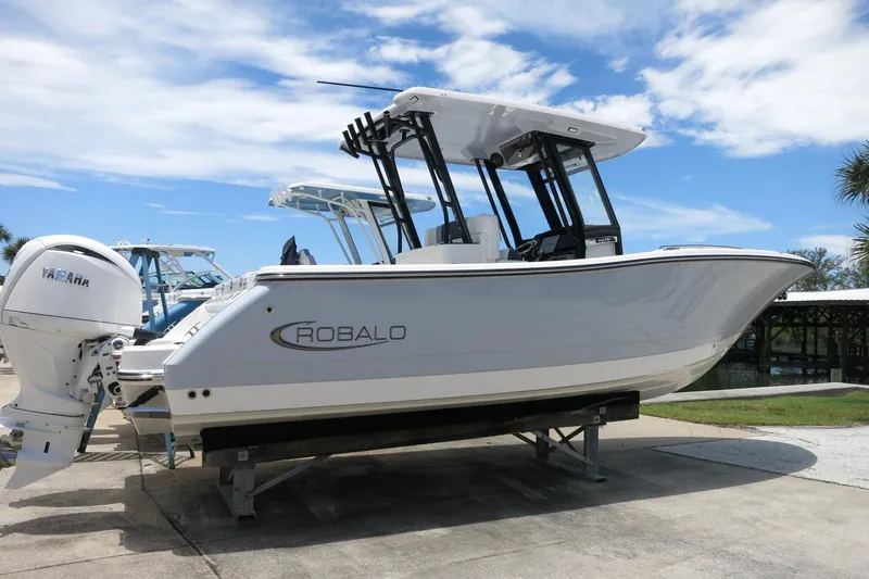 Slide: The Image of 2026 Robalo R270 Center Console boat with Yamaha engine on display. - 37