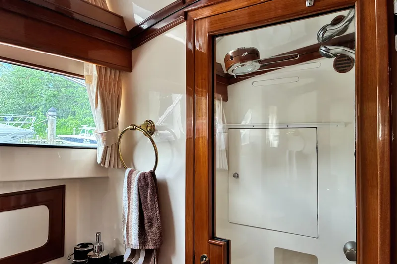 Slide: The Image of Luxurious Marlow 375 yacht bathroom interior with wood accents, 2005 model. - 36