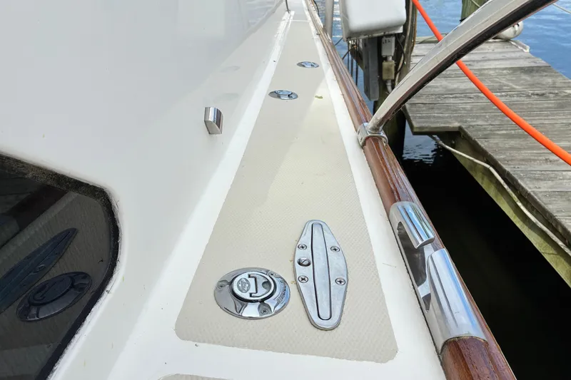 Slide: The Image of Deck view of a 2005 Marlow 375 yacht docked at a marina. - 11