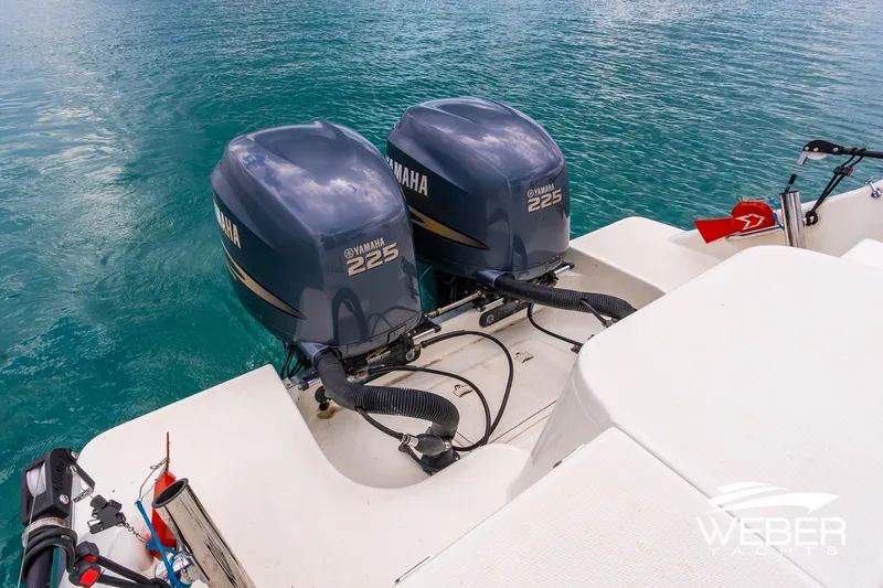 Slide: The Image of 2004 Hydra-Sports Vector 2800 WA with twin Yamaha 225 engines on turquoise water. - 14
