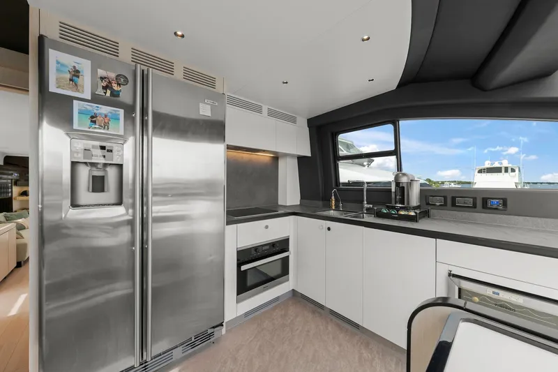 Slide: The Image of Modern kitchen interior on 2020 Azimut Fly 78 yacht with stainless steel appliances. - 50