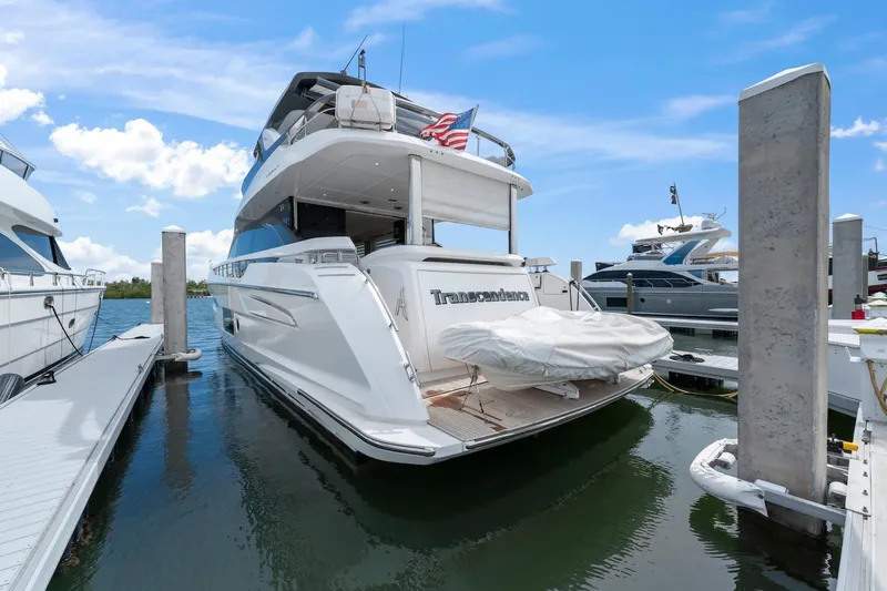 Slide: The Image of Azimut Fly 78 yacht docked at marina, showcasing sleek design and luxury features. - 18
