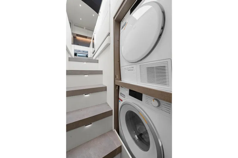 Slide: The Image of Staircase with washer and dryer on Azimut Fly 78 yacht, 2020 model. - 60