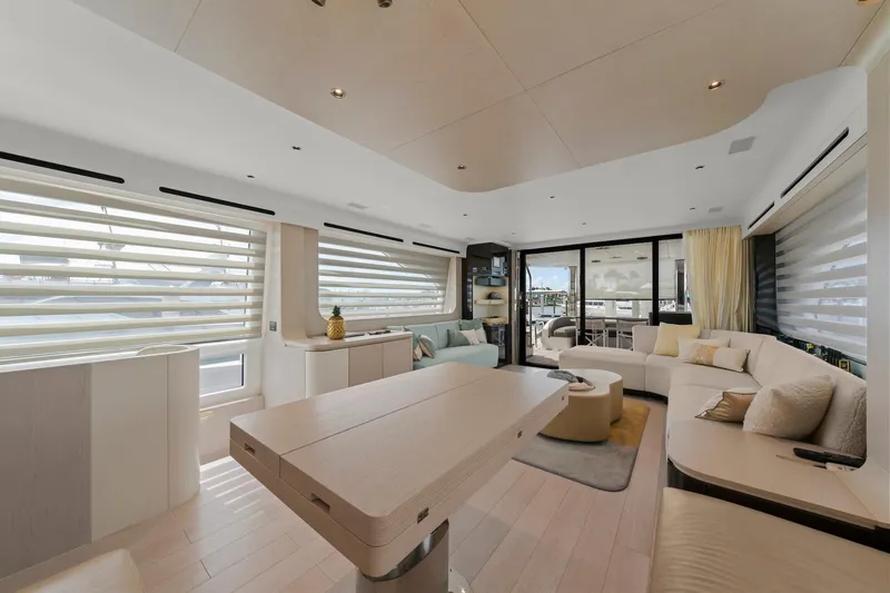 Slide: The Image of Luxurious interior of 2020 Azimut Fly 78 yacht with modern furnishings and ample natural light. - 77