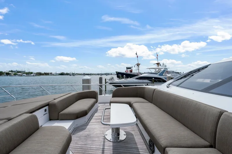 Slide: The Image of Luxurious 2020 Azimut Fly 78 yacht deck with elegant seating and ocean view. - 9