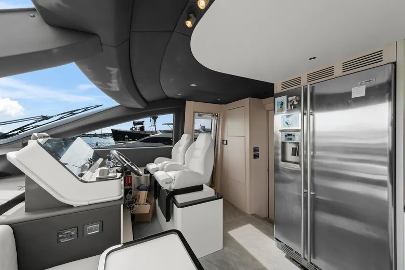 Slide: The Image of Luxurious interior of 2020 Azimut Fly 78 yacht with modern helm and stainless steel appliances. - 53