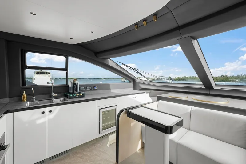 Slide: The Image of Luxurious interior of 2020 Azimut Fly 78 yacht with modern kitchen and scenic ocean view. - 47