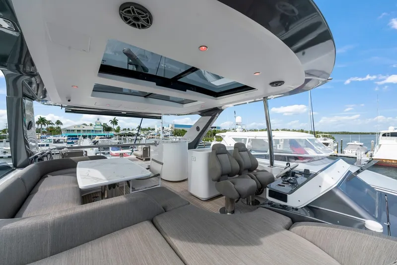 Slide: The Image of Luxurious 2020 Azimut Fly 78 yacht interior with plush seating and modern helm station. - 44