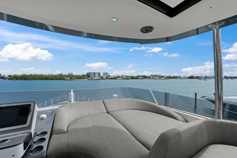 Slide: The Image of Luxurious 2020 Azimut Fly 78 yacht interior with scenic waterfront view. - 29