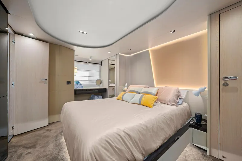 Slide: The Image of Luxurious bedroom interior of 2020 Azimut Fly 78 yacht with modern design and ambient lighting. - 84