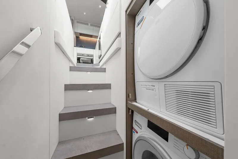 Slide: The Image of Staircase in 2020 Azimut Fly 78 yacht with built-in laundry appliances. - 59